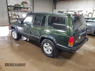 1998 Jeep Cherokee Sport with VIN 1J4FJ68S3WL146331, listed as a Copart auction lot 49420995 with 200,040 mi miles and Salvage Title. Bid and sale history available at carsss.com. Image 2.