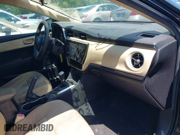 2019 Toyota Corolla L with VIN 5YFBURHE4KP860848, listed as a IAAI auction lot 42167529 with 152,301 mi miles. Bid and sale history available at carsss.com. Image 5.