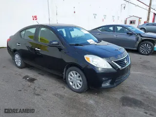 2012 Nissan Versa SV with VIN 3N1CN7AP1CL928719, listed as a IAAI auction lot 41879729 with 128,610 mi miles. Bid and sale history available at carsss.com. Image 1.