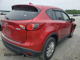 2014 Mazda CX-5 Touring z VIN JM3KE4CY3E0382106, wystawiony jako Copart lot #55521645 z przebiegiem 84 539 mil mil oraz Szkoda całkowita • Salvage title. Historia ofert i sprzedaży dostępna na DreamBid. Obrazek 3.