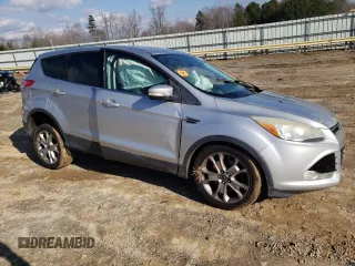 2013 Ford Escape SEL with VIN 1FMCU9HX7DUA60178, listed as a Copart auction lot 85203234 with 144,153 mi miles and Salvage Title. Bid and sale history available at carsss.com. Image 4.