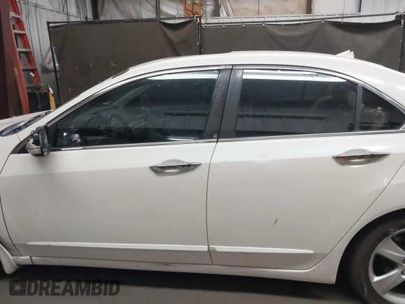 2009 Acura TSX with VIN JH4CU26669C028582, listed as a IAAI auction lot 42074708 with 194,316 mi miles. Bid and sale history available at carsss.com. Image 15.