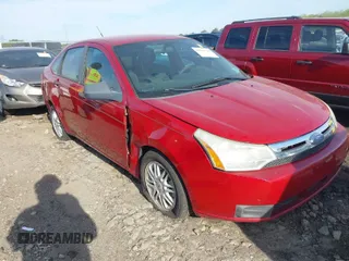 2009 Ford Focus SE with VIN 1FAHP35N89W188335, listed as a IAAI auction lot 41800622 with 164,176 mi miles. Bid and sale history available at carsss.com. Image 1.