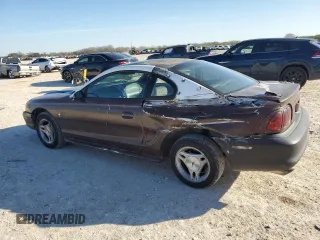 1997 Ford Mustang with VIN 1FALP4043VF174092, listed as a Copart auction lot 86983884 with 105,774 mi miles and Salvage Title. Bid and sale history available at carsss.com. Image 2.