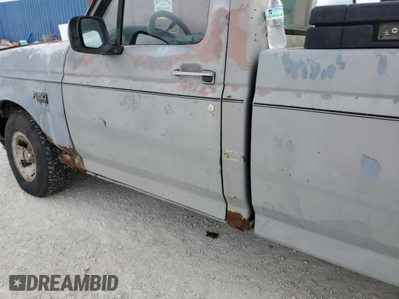 1992 Ford F-150 with VIN 1FTDF15Y2NLB00580, listed as a Copart auction lot 76871004 with 0 mi miles and Salvage Title. Bid and sale history available at carsss.com. Image 12.