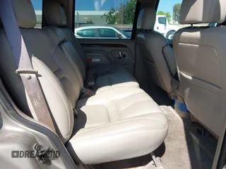 1999 Cadillac Escalade z VIN 1GYEK13R4XR419503, wystawiony jako IAAI lot #42215638 z przebiegiem 174 381 mil mil oraz . Historia ofert i sprzedaży dostępna na DreamBid. Obrazek 8.