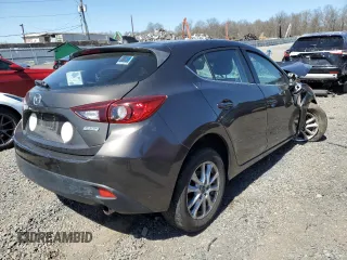 2014 Mazda 3 i Grand Touring with VIN JM1BM1M74E1206837, listed as a Copart auction lot 52314345 with Not Provided miles and Salvage Title. Bid and sale history available at DreamBid. Image 3.