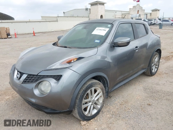 2015 Nissan Juke S with VIN JN8AF5MR8FT512769, listed as a IAAI auction lot 42102306 with 74,952 mi miles. Bid and sale history available at carsss.com. Image 2.