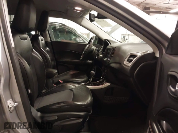 2019 Jeep Compass Latitude with VIN 3C4NJDBB6KT812711, listed as a IAAI auction lot 41565166 with 69,582 mi miles and . Bid and sale history available at carsss.com. Image 5.