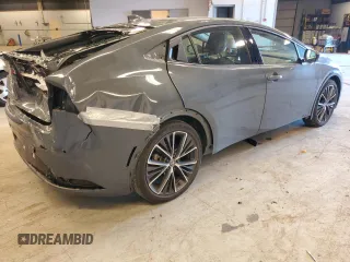 2023 Toyota Prius LE with VIN JTDADABU7P3004165, listed as a Copart auction lot 77584654 with 20,911 mi miles and Salvage Title. Bid and sale history available at DreamBid. Image 3.