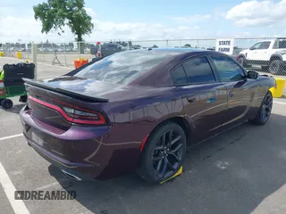 2022 Dodge Charger SXT with VIN 2C3CDXBG4NH208748, listed as a IAAI auction lot 41916434 with 54,053 mi miles and . Bid and sale history available at DreamBid. Image 4.