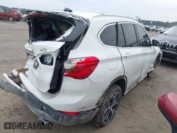 2018 BMW X1 xDrive28i with VIN WBXHT3C31J5K22765, listed as a IAAI auction lot 41800397 with 110,205 mi miles and . Bid and sale history available at DreamBid. Image 4.