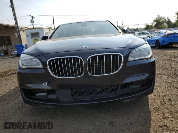 2015 BMW 7 Series 750i xDrive with VIN WBAYB6C53FD966042, listed as a Copart auction lot 69387464 with 64,977 mi miles and Salvage Title. Bid and sale history available at carsss.com. Image 5.