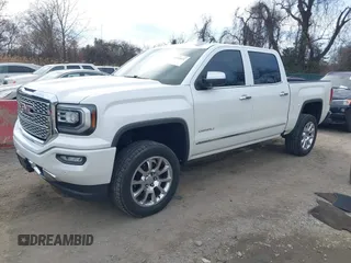 2017 GMC Sierra 1500 Denali with VIN 3GTU2PEC2HG438632, listed as a IAAI auction lot 41838632 with 80,319 mi miles and . Bid and sale history available at DreamBid. Image 2.