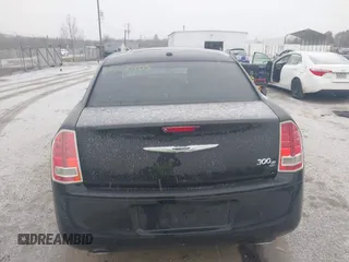 2013 Chrysler 300 with VIN 2C3CCABT7DH652797, listed as a IAAI auction lot 41602405 with 203,920 mi miles. Bid and sale history available at carsss.com. Image 16.