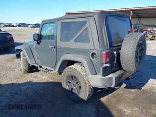 2016 Jeep Wrangler Sport with VIN 1C4AJWAG3GL173696, listed as a IAAI auction lot 41760761 with 59,240 mi miles and . Bid and sale history available at carsss.com. Image 3.