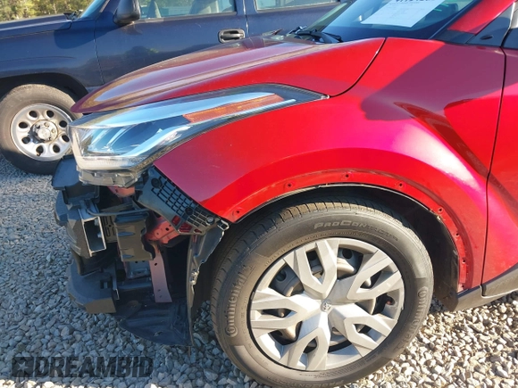 2020 Toyota C-HR LE with VIN JTNKHMBXXL1090061, listed as a IAAI auction lot 41124269 with 99,034 mi miles. Bid and sale history available at carsss.com. Image 6.