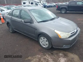 2009 Ford Focus S with VIN 1FAHP34N39W151811, listed as a IAAI auction lot 41911138 with 125,325 mi miles. Bid and sale history available at carsss.com. Image 1.