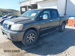 2004 Nissan Titan LE with VIN 1N6AA07B24N574789, listed as a IAAI auction lot 42039183 with 147,691 mi miles. Bid and sale history available at carsss.com. Image 2.