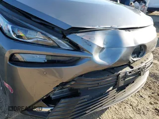 2023 Toyota Mirai XLE with VIN JTDAAAAAXPA010313, listed as a IAAI auction lot 41867909 with 11,996 mi miles. Bid and sale history available at carsss.com. Image 6.