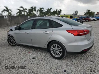 2018 Ford Focus SE with VIN 1FADP3F28JL256318, listed as a Copart auction lot 55524544 with 136,723 mi miles and Salvage title. Bid and sale history available at DreamBid. Image 2.