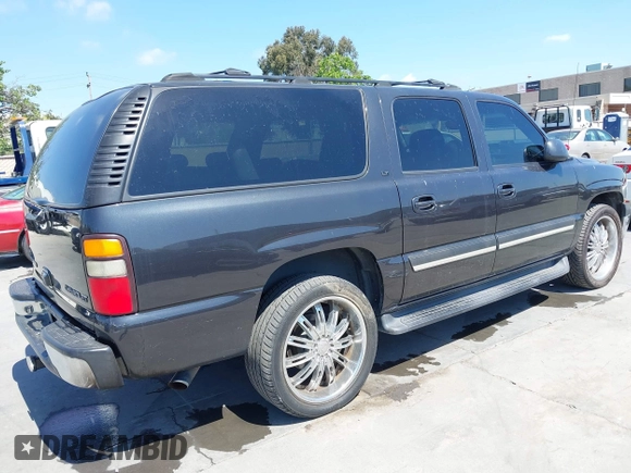 2005 Chevrolet Suburban Z71 with VIN 3GNFK16Z35G126718, listed as a IAAI auction lot 42084280 with 237,875 mi miles. Bid and sale history available at carsss.com. Image 4.