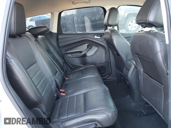 2016 Ford Escape Titanium with VIN 1FMCU9J95GUA69932, listed as a Copart auction lot 88470175 with 108,471 mi miles and Salvage title. Bid and sale history available at DreamBid. Image 11.
