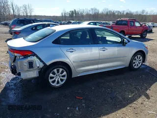 2023 Toyota Corolla Hybrid LE with VIN JTDBCMFE1P3015786, listed as a IAAI auction lot 41887102 with 27,123 mi miles. Bid and sale history available at carsss.com. Image 13.