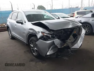 2023 Mazda CX-9 Touring with VIN JM3TCBCY6P0657078, listed as a IAAI auction lot 42125568 with 42,625 mi miles and . Bid and sale history available at DreamBid. Image 1.