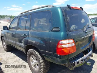 2001 Toyota Land Cruiser z VIN JTEHT05J612006883, wystawiony jako IAAI lot #42351679 z przebiegiem 177 690 mil mil oraz . Historia ofert i sprzedaży dostępna na DreamBid. Obrazek 15.