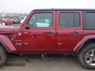 2021 Jeep Wrangler Unlimited Sahara z VIN 1C4HJXEG3MW720572, wystawiony jako IAAI lot #41899645 z przebiegiem 43 097 mil mil oraz . Historia ofert i sprzedaży dostępna na DreamBid. Obrazek 14.
