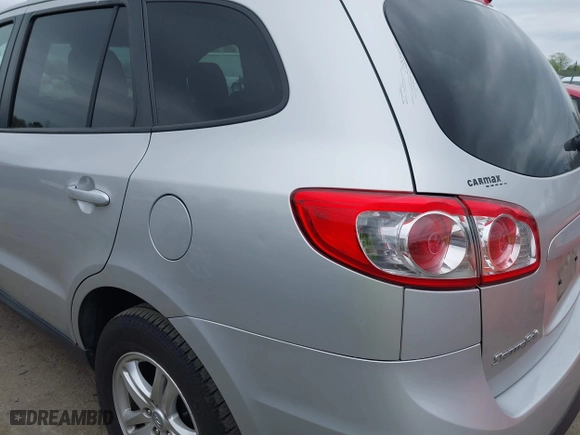 2012 Hyundai Santa Fe GLS with VIN 5XYZG3AB3CG124427, listed as a IAAI auction lot 41953057 with 156,413 mi miles. Bid and sale history available at carsss.com. Image 6.