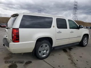 2010 Chevrolet Suburban LTZ with VIN 1GNUKKE35AR292291, listed as a Copart auction lot 49627085 with 233,359 mi miles and Salvage Title. Bid and sale history available at carsss.com. Image 3.