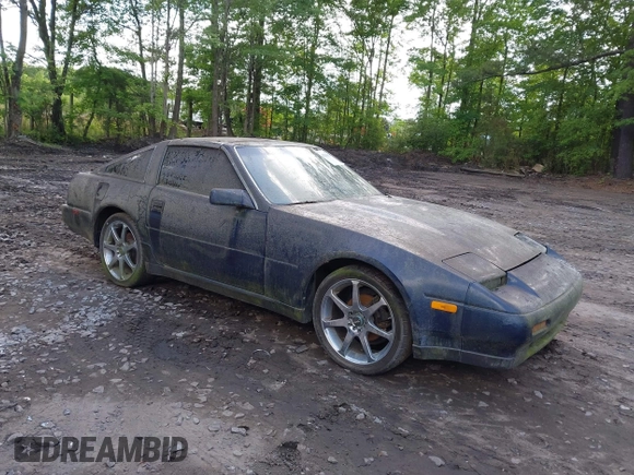 1989 Nissan 300ZX z VIN JN1HZ14S7KX290051, wystawiony jako IAAI lot #42203078 z przebiegiem 136 643 mil mil oraz . Historia ofert i sprzedaży dostępna na DreamBid. Obrazek 1.