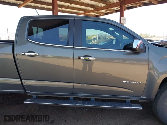 2017 GMC Canyon 4WD Denali z VIN 1GTG6EENXH1315022, wystawiony jako IAAI lot #42152968 z przebiegiem 108 933 mil mil oraz . Historia ofert i sprzedaży dostępna na DreamBid. Obrazek 13.