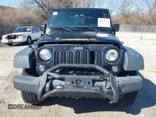 2014 Jeep Wrangler Sport with VIN 1C4AJWAGXEL319749, listed as a IAAI auction lot 41752779 with 140,045 mi miles and . Bid and sale history available at DreamBid. Image 12.