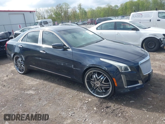 2015 Cadillac CTS Luxury AWD with VIN 1G6AX5SX5F0119102, listed as a IAAI auction lot 42231015 with 106,643 mi miles and . Bid and sale history available at DreamBid. Image 1.