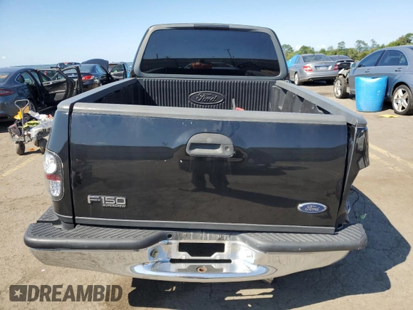 1999 Ford F-150 XL с VIN 2FTRX08L4XCA00426, выставлен на аукционе Copart как лот 68354464 с пробегом 157 539 миль миль и Списание • Salvage title. История ставок и продаж доступна на DreamBid. Изображение 6.