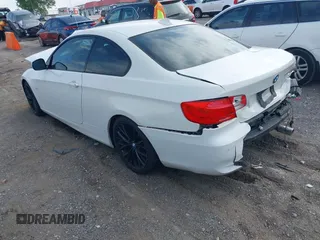 2011 BMW 3 Series 335i with VIN WBAKG7C56BE598702, listed as a IAAI auction lot 42159394 with Not provided miles and . Bid and sale history available at DreamBid. Image 3.