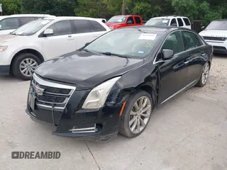 2017 Cadillac XTS Luxury z VIN 2G61M5S32H9158776, wystawiony jako IAAI lot #42528442 z przebiegiem 90 680 mil mil oraz . Historia ofert i sprzedaży dostępna na DreamBid. Obrazek 16.