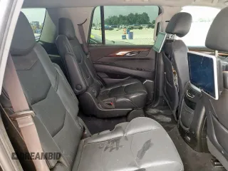 2018 Cadillac Escalade z VIN 1GYS3AKJ6JR256100, wystawiony jako Copart lot #57900755 z przebiegiem 129 775 mil mil oraz Szkoda całkowita • Salvage title. Historia ofert i sprzedaży dostępna na DreamBid. Obrazek 11.