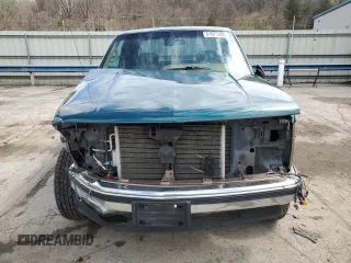 1995 GMC Sierra 1500 z VIN 2GTEK19K3S1511767, wystawiony jako Copart lot #51977295 z przebiegiem 215 667 mil mil oraz Szkody całkowita. Historia ofert i sprzedaży dostępna na DreamBid. Obrazek 5.