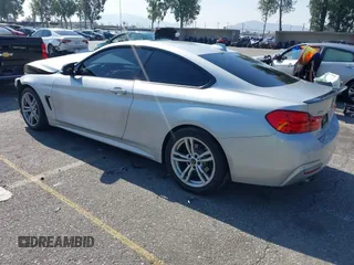2014 BMW 4 Series 428i xDrive with VIN WBA3N9C54EF721188, listed as a IAAI auction lot 42143305 with Not provided miles and . Bid and sale history available at DreamBid. Image 3.