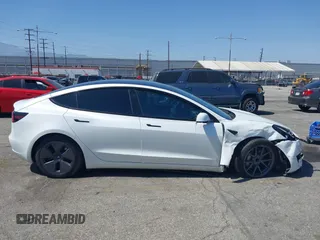 2023 Tesla Model 3 with VIN 5YJ3E1EA0PF621448, listed as a IAAI auction lot 42500155 with 26,589 mi miles and . Bid and sale history available at DreamBid. Image 14.