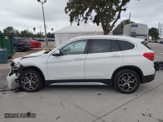2018 BMW X1 xDrive28i with VIN WBXHT3C37J3H33461, listed as a IAAI auction lot 40997589 with 1 mi miles. Bid and sale history available at carsss.com. Image 15.
