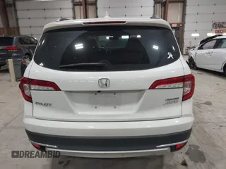 2022 Honda Pilot Touring 7-Passenger with VIN 5FNYF6H63NB063857, listed as a IAAI auction lot 41936941 with 54,424 mi miles. Bid and sale history available at carsss.com. Image 15.