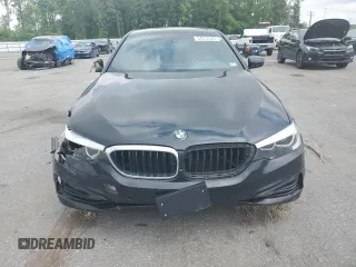 2018 BMW 5 Series 540i with VIN WBAJE5C54JWA93338, listed as a Copart auction lot 54312385 with 77,537 mi miles and Salvage title. Bid and sale history available at DreamBid. Image 5.