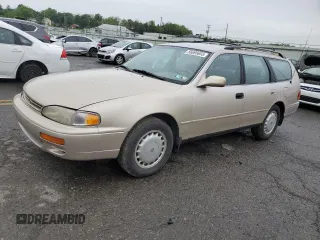1996 Toyota Camry LE z VIN 4T1EF12K0TU140325, wystawiony jako Copart lot #56695655 z przebiegiem 190 447 mil mil oraz Szkoda całkowita • Salvage title. Historia ofert i sprzedaży dostępna na DreamBid. Obrazek 1.