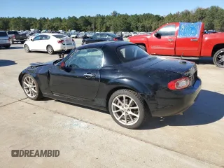 2010 Mazda MX-5 Miata Grand Touring with VIN JM1NC2FFXA0206089, listed as a Copart auction lot 76752674 with 212,584 mi miles and Salvage title. Bid and sale history available at DreamBid. Image 2.