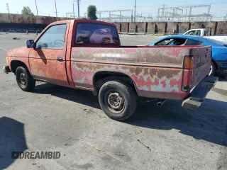 1987 Nissan Hardbody E z VIN JN6ND11S3HW006235, wystawiony jako Copart lot #78528914 z przebiegiem 298 079 mil mil oraz Szkody całkowita. Historia ofert i sprzedaży dostępna na DreamBid. Obrazek 2.